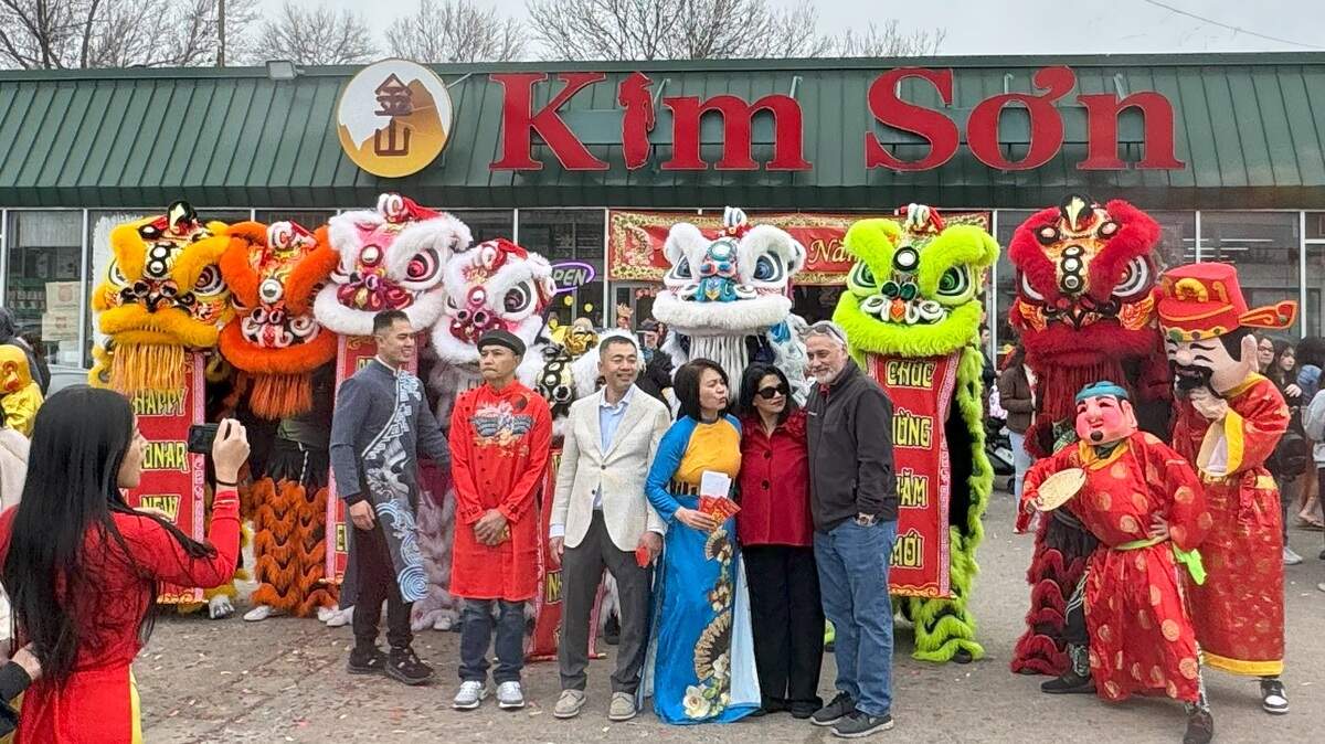 The staff at Kim Son Asian Food Market, 960 E. Pawnee, are pictured after the lion dance performance at their 2024 Lunar New Year celebration.