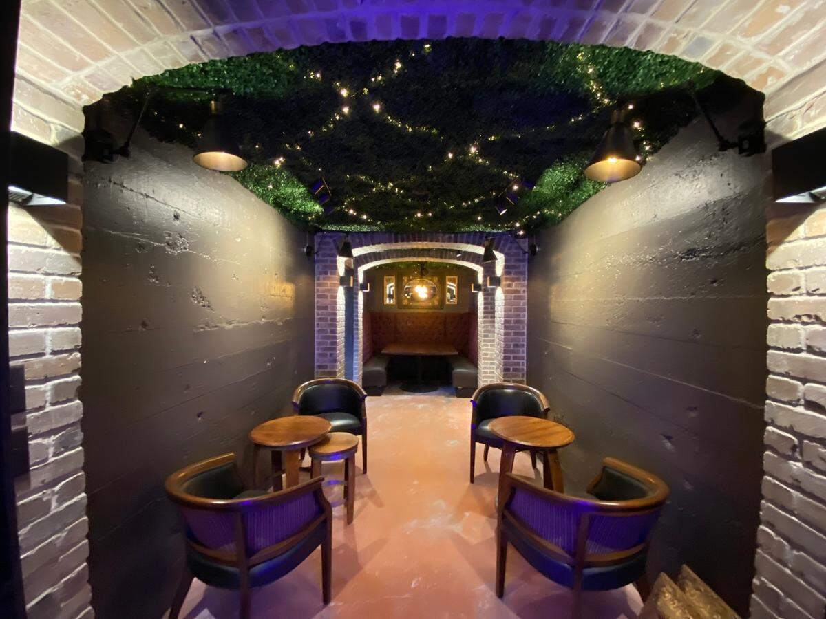 A private party room that can seat 8 to 12 occupies a former bank vault in the new Alzavino Wine Tavern in Wichita’s Delano district.