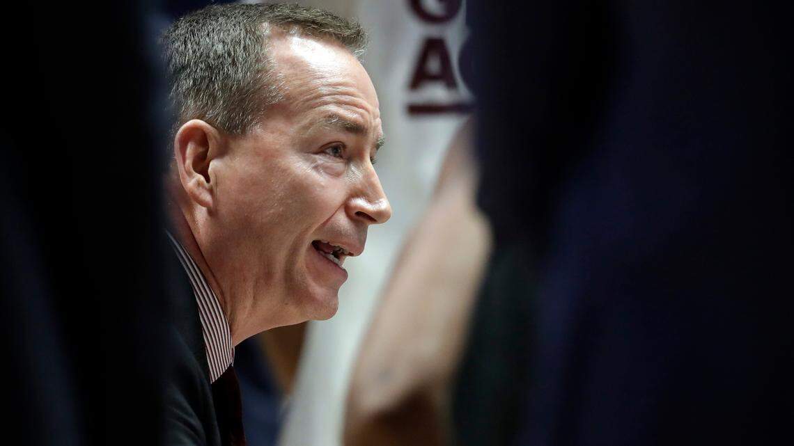 Texas A&M head coach Billy Kennedy talks with his players in the second half of an NCAA college basketball game against Vanderbilt at the Southeastern Conference tournament, Wednesday, March 13, 2019, in Nashville, Tenn. Texas A&M won 69-52. (AP Photo/Mark Humphrey)
