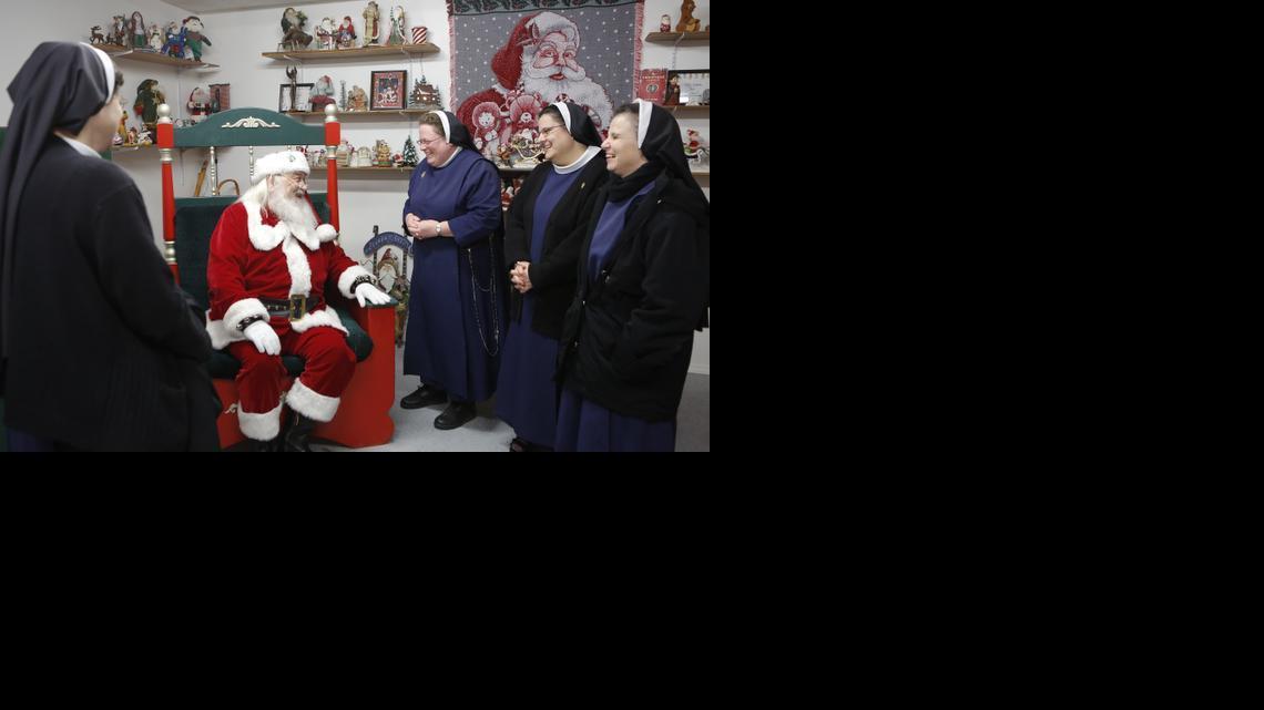 Sisters of the Immaculate Heart of Mary visit with Santa at the North Pole Express at 1841 S. Glenn. (Dec. 19, 2013)

