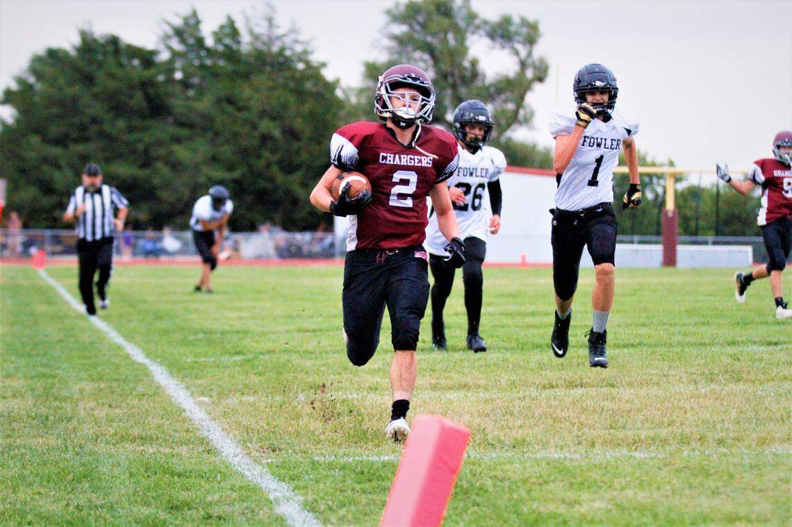 Burrton junior running back Austin Lazenby jogs into the end zone for a touchdown against Fowler in the Chargers’ first win in 1,107 days.