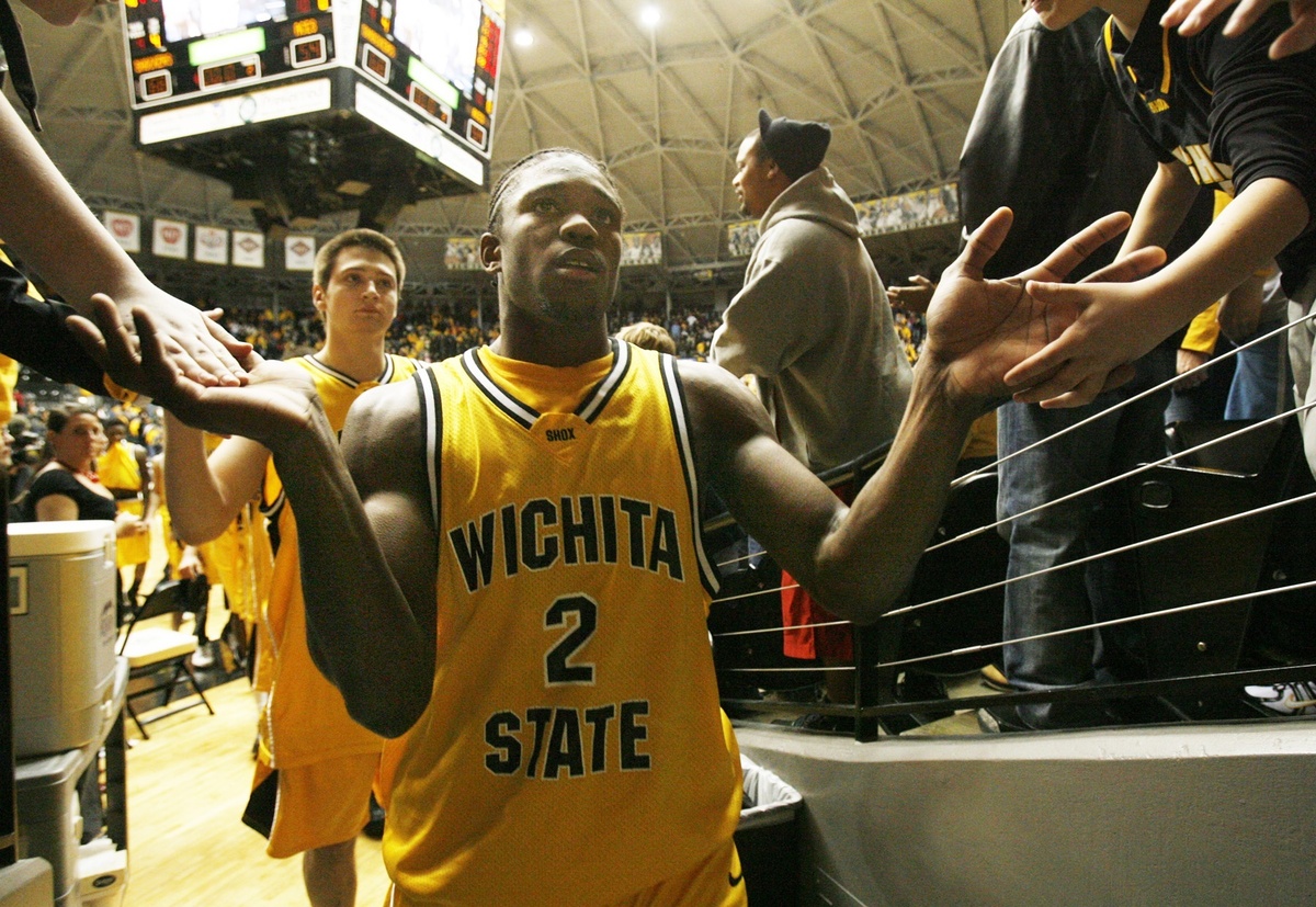 WSU senior P.J. Couisnard leaves the court after his lasthome game of the  season Tuesday night.