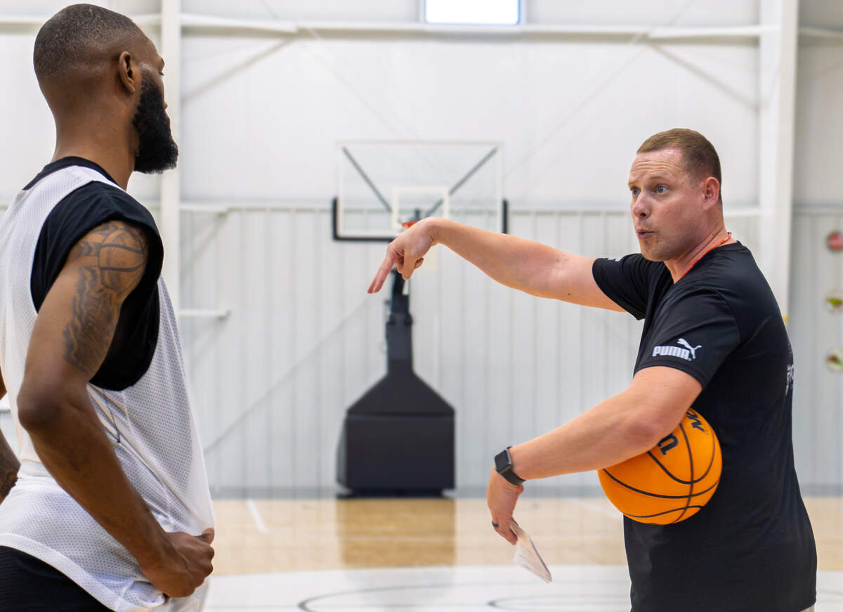 AfterShocks coach Zach Bush directs players during a practice on Tuesday, July 15.
