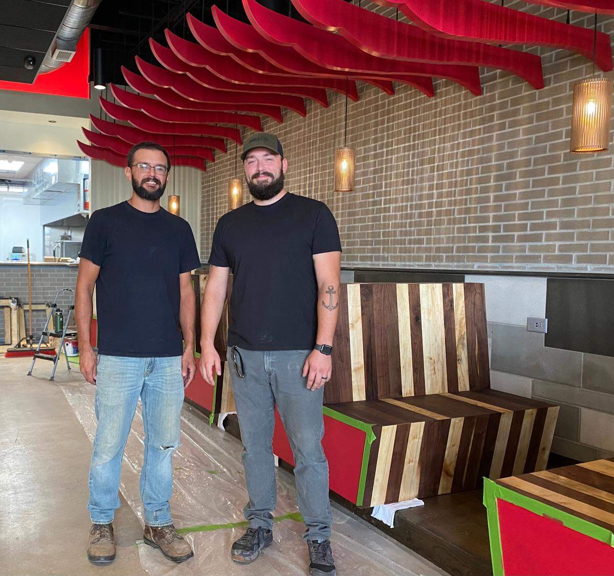 Sebastian Gordon, right, will open his long-awaited Red Bird restaurant sometime in October. He’s pictured here with kitchen manager Matt Edwards.