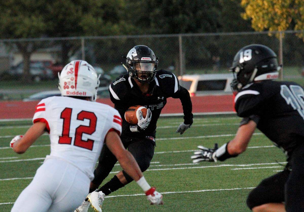 Campus senior receiver Cameron Harvey looks upfield during the Colts’ 21-0 loss to Maize on Friday night. (Sept. 15, 2018)