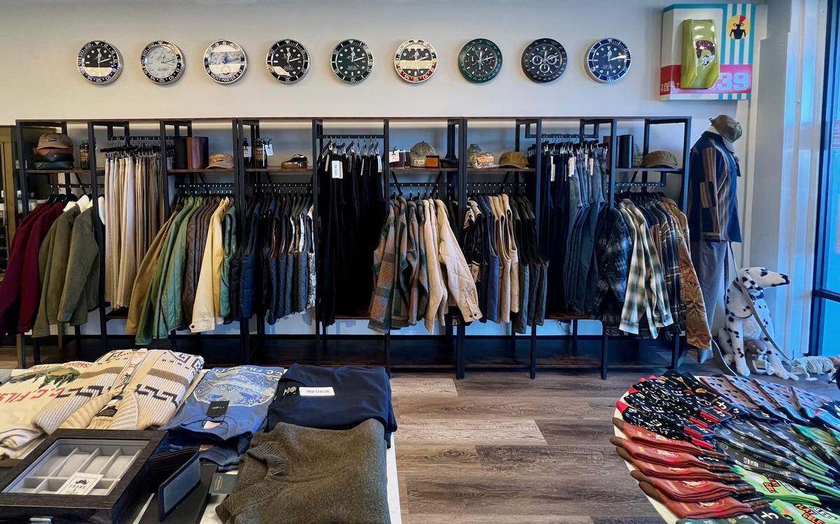 The men’s clothing along with dog treats and accessories currently at Frank & Fido in Lincoln Heights Village soon will be available within the Aspen Boutique space.
