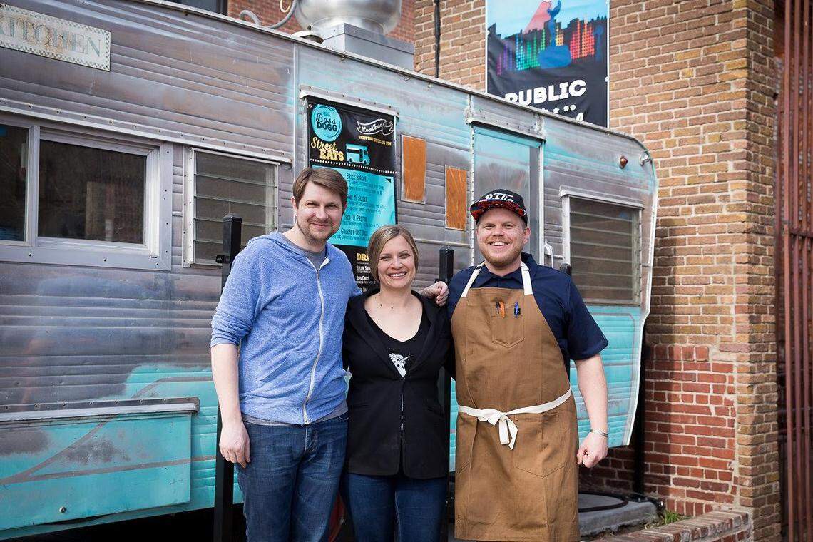 Public owners Drew Thompson, left, Brooke Russell and Travis Russell are now selling frozen pizzas, and they’ll deliver on Friday.