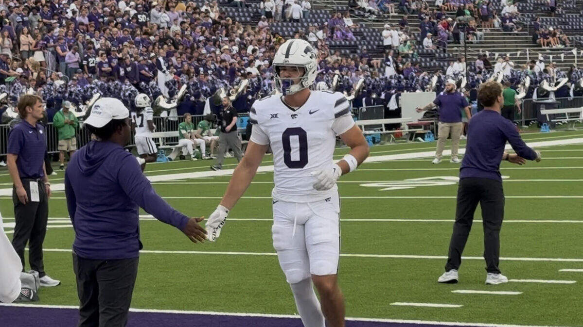 Kansas State freshman Linkon Cure warms up before a game at Bill Snyder Family Stadium