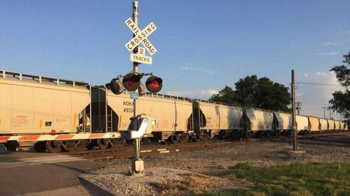 The BNSF Railroad is challenging a state law regulating how long trains can stop traffic at railroad crossings.