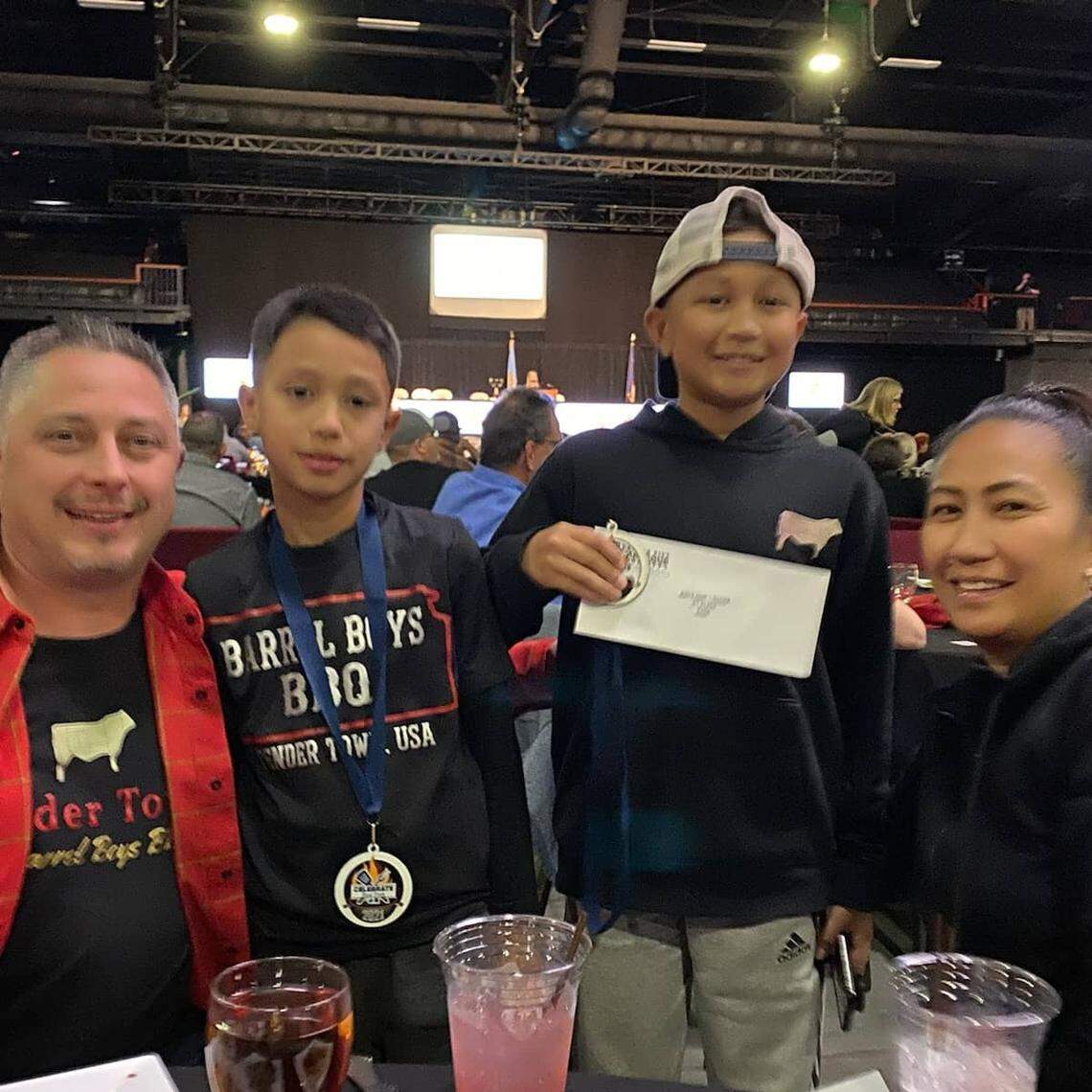 Buddy King, left, is opening a new barbecue restaurant with the help of his family including sons Chase, second from left, Rainen and wife Joana.