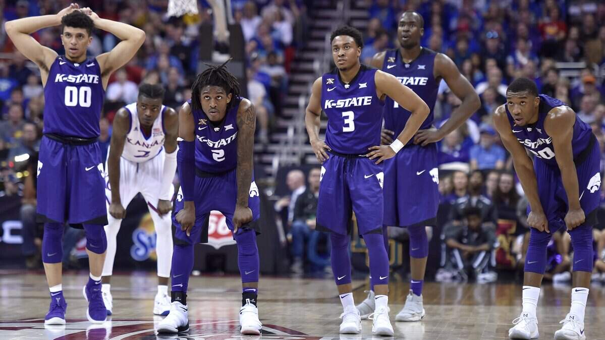 As another loss to KU loomed, there were a lot of long faces for Kansas State as the Wildcats watched KU's Devonte' Graham shoot free throws near the conclusion of the semi-final game Friday night in the Big 12 Tournament. KU beat KSU, 83-67.