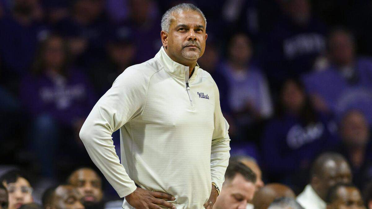 Kansas State head coach Jerome Tang watches as his team plays against Oklahoma State during the first half of an NCAA college basketball game in Manhattan, Kan., Tuesday, Jan. 10, 2023. (AP Photo/Reed Hoffmann)