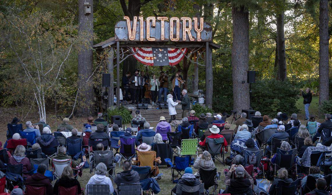 One of the old neon signs from the Victory Theater in downtown Wichita now hangs over the performance stage at Bartlett Arboretum in Belle Plaine. Hayde Bluegrass Orchestra, a Bluegrass band from Norway, performed there on Nov. 2.