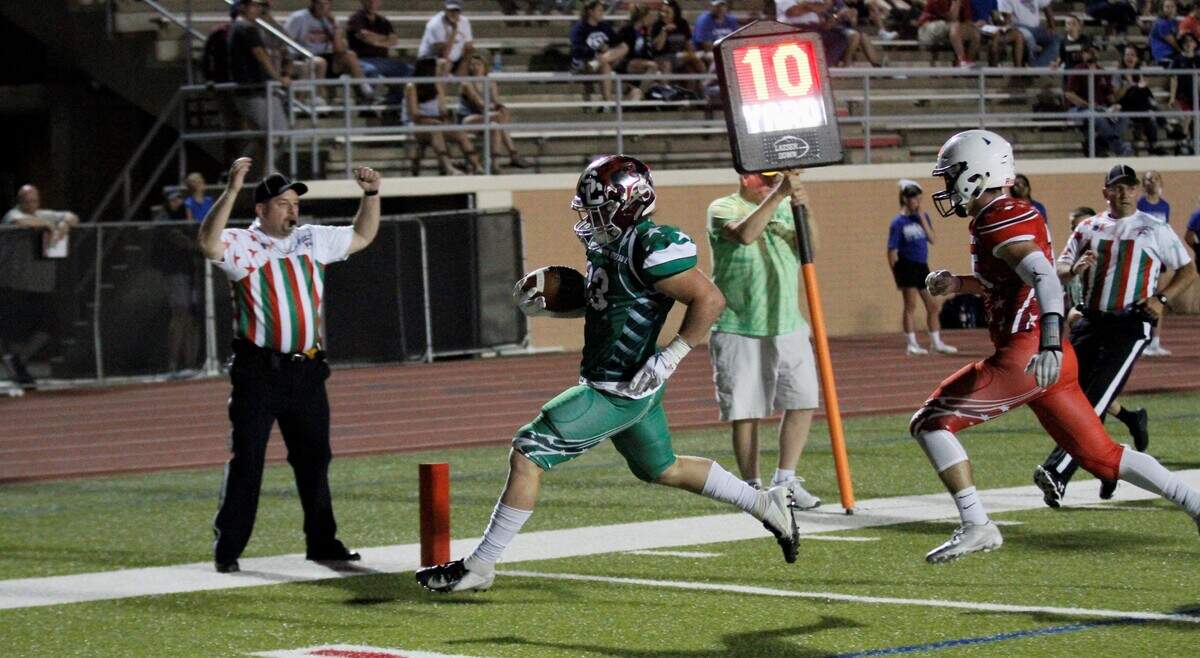 West running back Taylon Peters (Salina Central) runs in for a score.