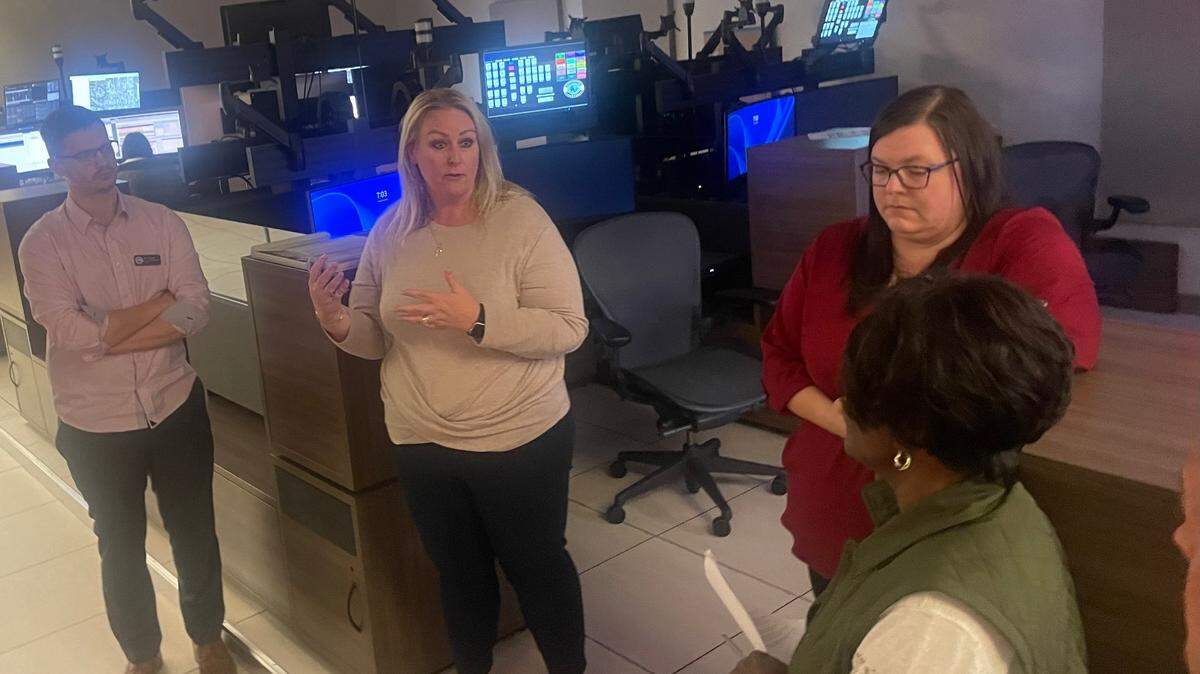 Sedgwick County Emergency Communications Director Elora Forshee leads members of the District 4 Citizen Advisory Board on a tour of her department’s headquarters, Jan. 30, 2024.