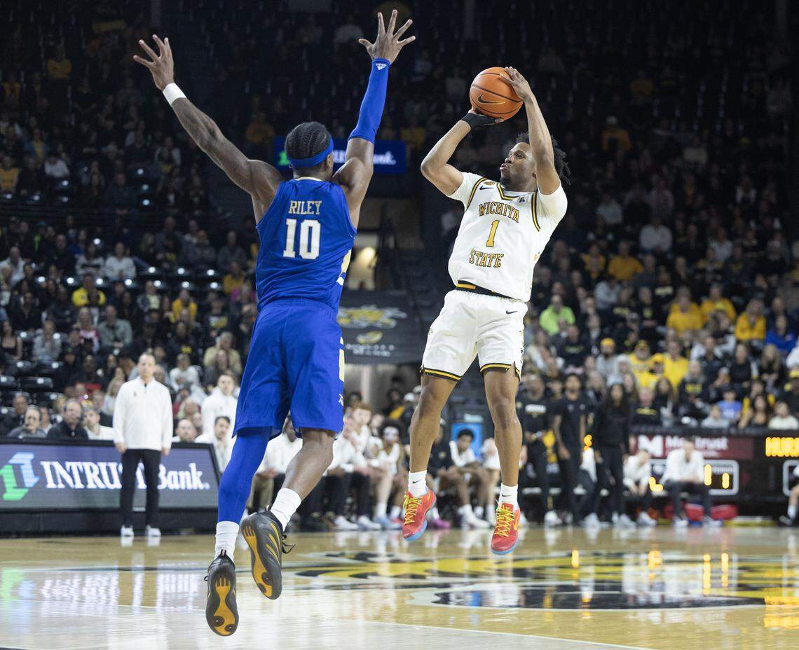 Wichita State’s Keyon Giles fires off a shot against Tulsa defender Tylen Riley during the first half at Koch Arena on Saturday night.