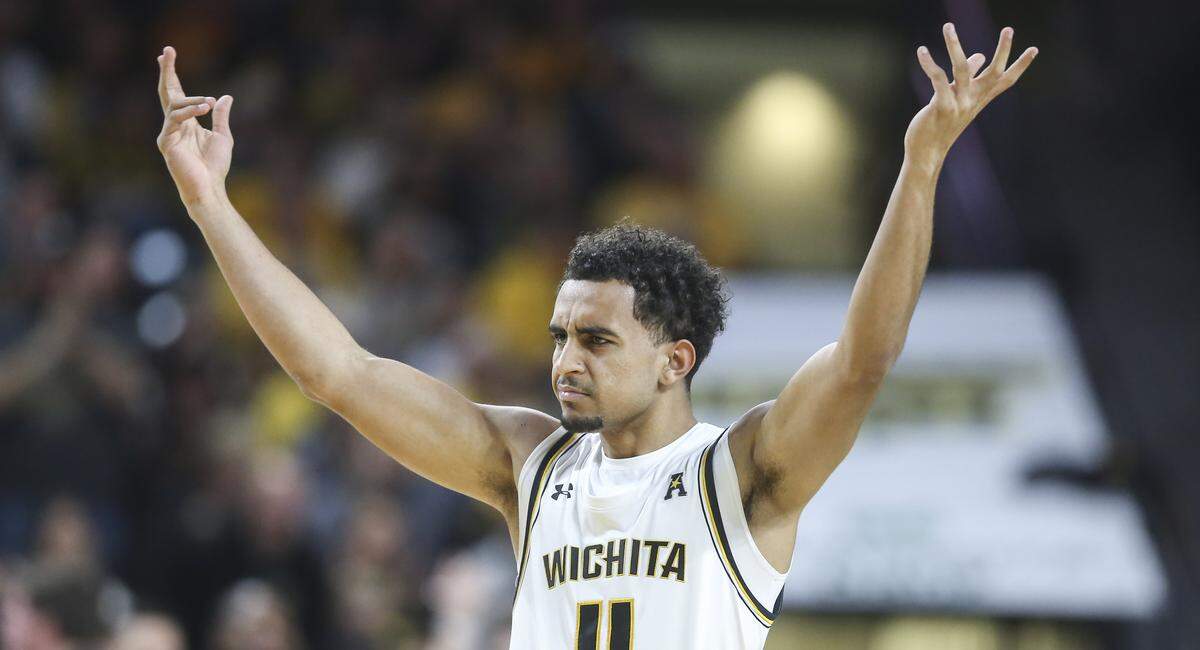 Wichita State’s Noah Fernandes tries to fire up the crowd during the first half against VCU at Koch Arena on Saturday.