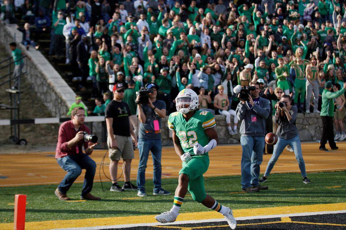 Derby running back Tre Washington celebrates one of his three touchdowns in Saturday’s 6A championship game in Emporia. (Nov. 24, 2018)