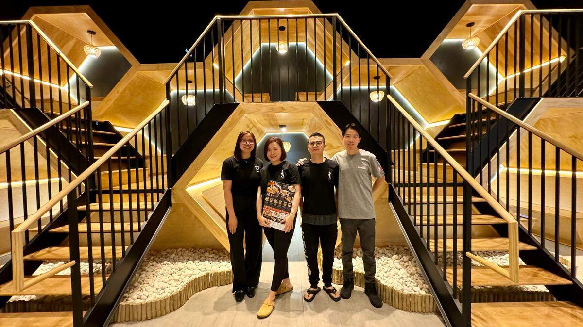 The owners of the soon-to-open Kyuramen/TBaar are, from left to right, Quinn Nguyen, Lee Li, Finn Fang and Leo Lin. Li and Lin are also the owners of Sapporo, the sushi restaurant at 8065 Peachtree Lane.