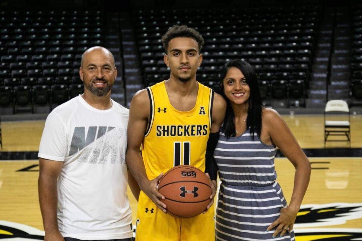 Noah Fernandes smiles with his parents on his official visit to Wichita State this past weekend. Fernandes ended up verbally committing to the Shockers on Sunday.