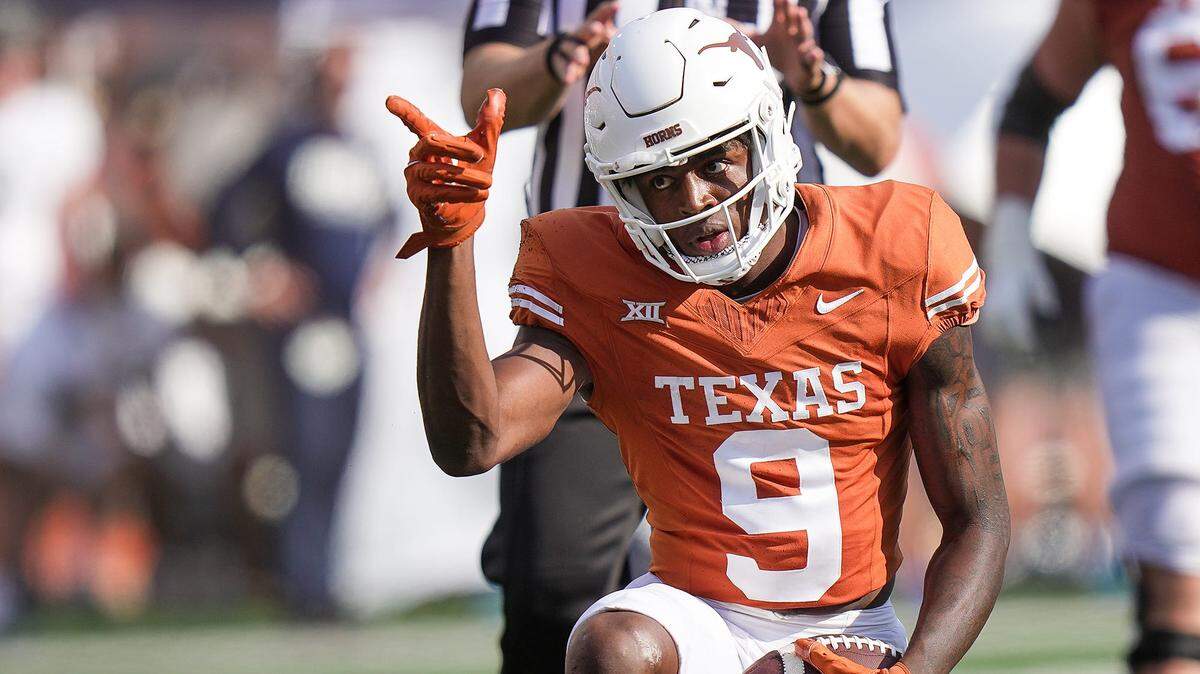 Texas Longhorns wide receiver Isaiah Neyor (9) points toward a first down in the fourth quarter of an NCAA college football game, Saturday, Sept. 2, 2023, in Austin, Texas.