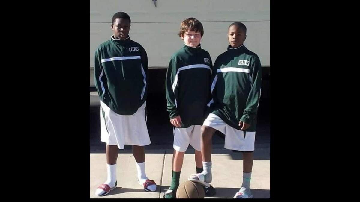 Quintin Thomas, Kaleb Gaddis and Knowledge McPherson pose for a photo.