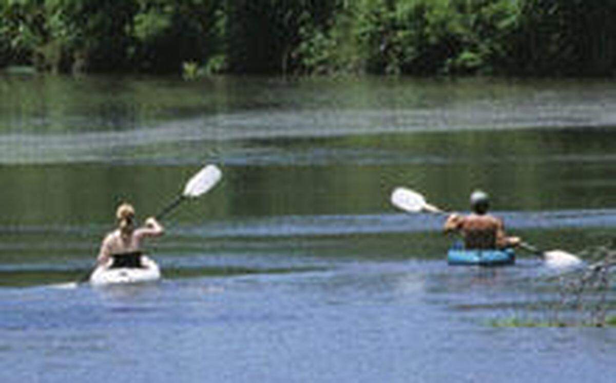 People enjoying the river at Kaw River State Park.