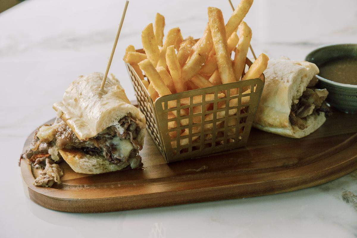 One of the items on the Point Nine menu, which was created by executive chef Bryce Turner, is a French dip sandwich.