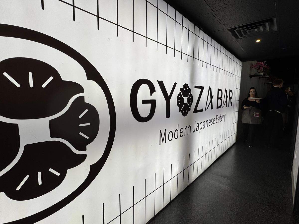 A hall full of light leads from the front dining room to the back dining room at the new Gyoza restaurant.
