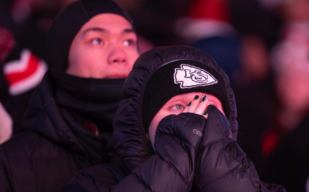 Chiefs fans watch in disbelief in downtown Kansas City on Sunday night as their team is defeated by the Philadelphia Eagles in the Super Bowl.