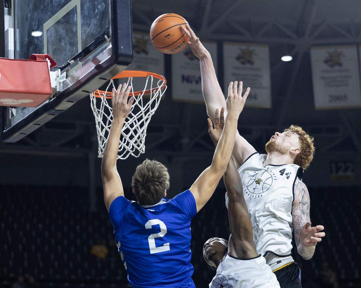 Wichita State’s Will Berg slams it home in a scrimmage against Drake at Koch Arena.