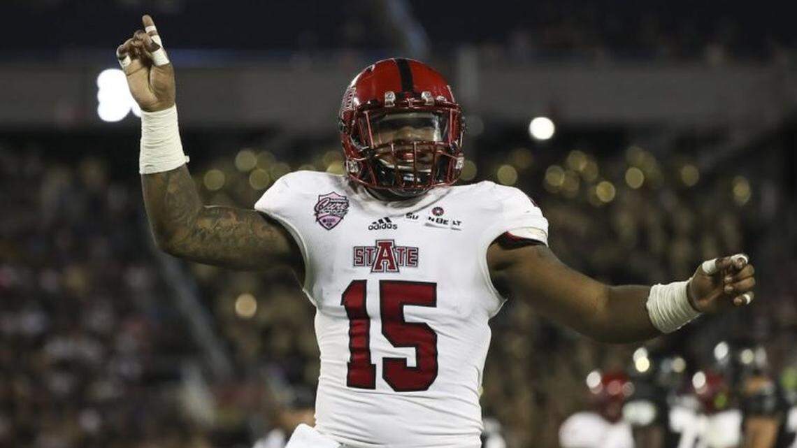 Kyle Wilson celebrates after making a tackle for Arkansas State (Courtesy Photo)
