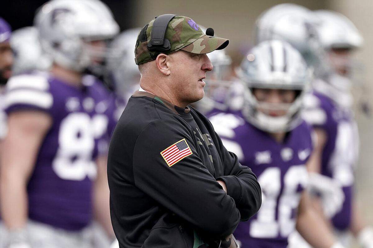 Kansas State head coach Chris Klieman watches from the sideline against West Virginia, Saturday, Nov. 13, 2021, in Manhattan, Kan.