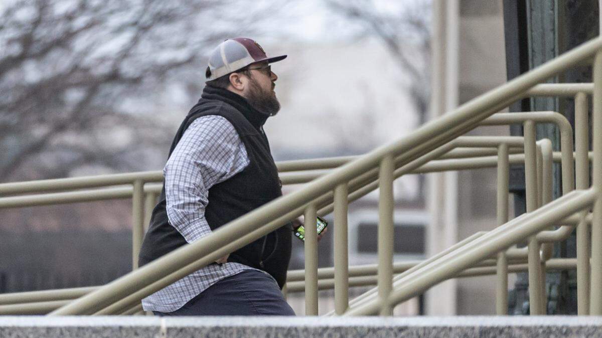 Former Wichita city council member James Clendenin heads up the stairs of the federal court house in downtown Wichita on Wednesday after his former business partner, Michael Capps, was found guilty on 12 felony charges. Clendenin was a witness at Capps’ trial and showed support for the former Kansas legislator all through the trial.