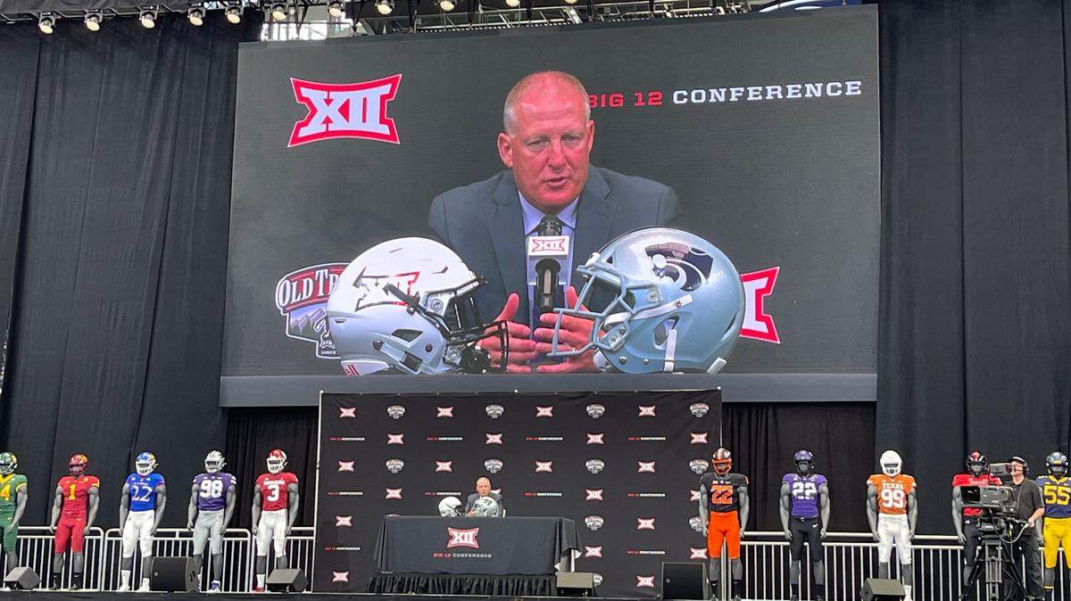 Kansas State football coach Chris Klieman talks at Big 12 media days at AT&T Stadium.