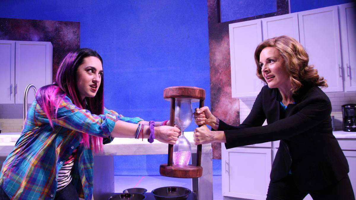A tug of war with a mysterious hourglass leads to unexpected complications for Ellie Blake (Chelsey Lynn Alfredo) and her mother Katherine (Kim Huber) in Music Theatre Wichita's "Freaky Friday," playing July 11-15 at Century II.