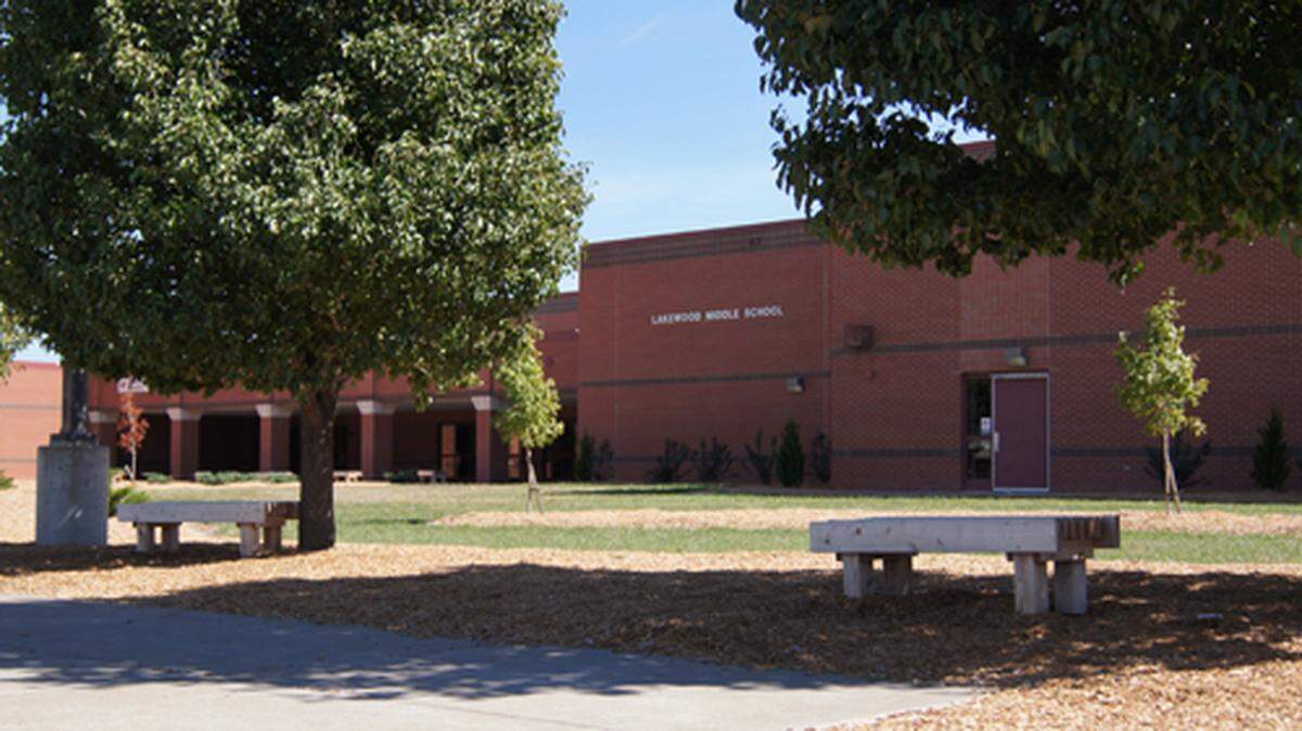 A teacher at Lakewood Middle School in Salina was arrested Monday following a scuffle with police detectives conducting a search warrant on the teacher’s cell phone.