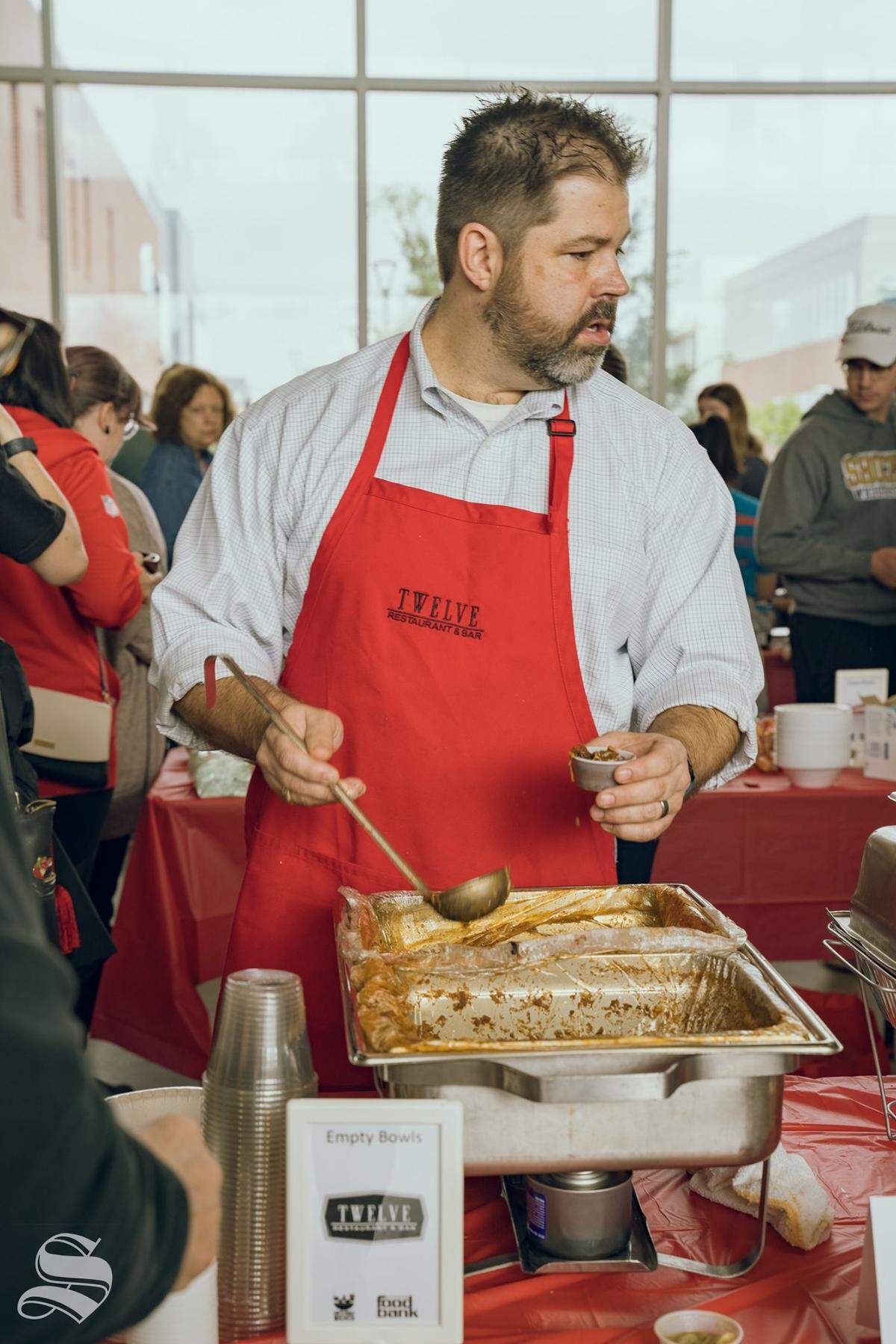 Bryce Kuhn, owner of Twelve, is one of many restaurant owners that will bring food to the Empty Bowls event on Saturday.