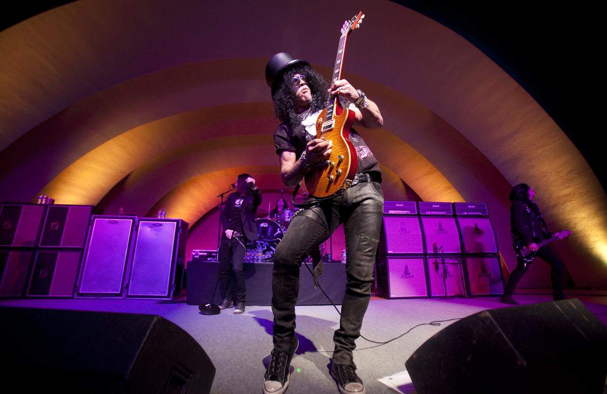 Former Guns N’ Roses guitarist Slash performs at the Cotillion in 2011.