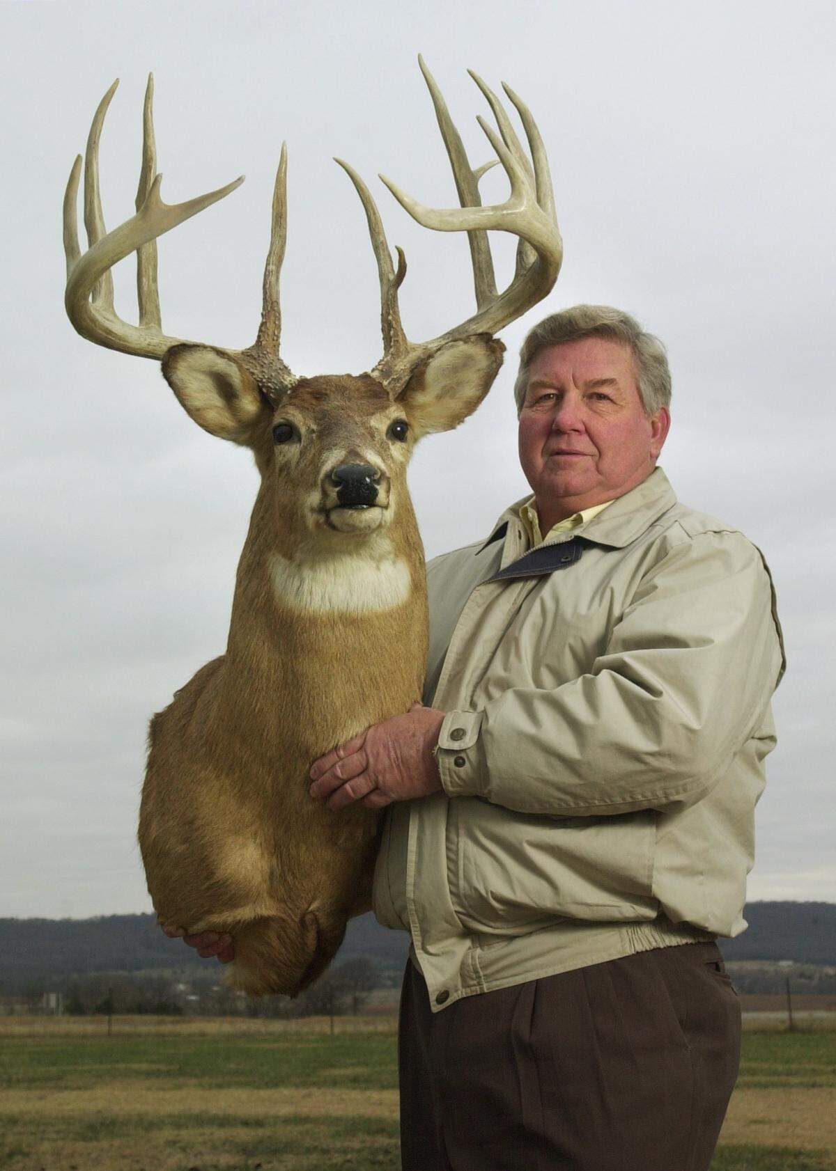 Denny Finger holds his record buck mount, a typical whitetail he shot in 1974 in Nemaha County. The “Finger Buck” has stood as the typical state record for 50 years, but could be replaced atop the list by a buck currently in the possession of Bass Pro Shops.