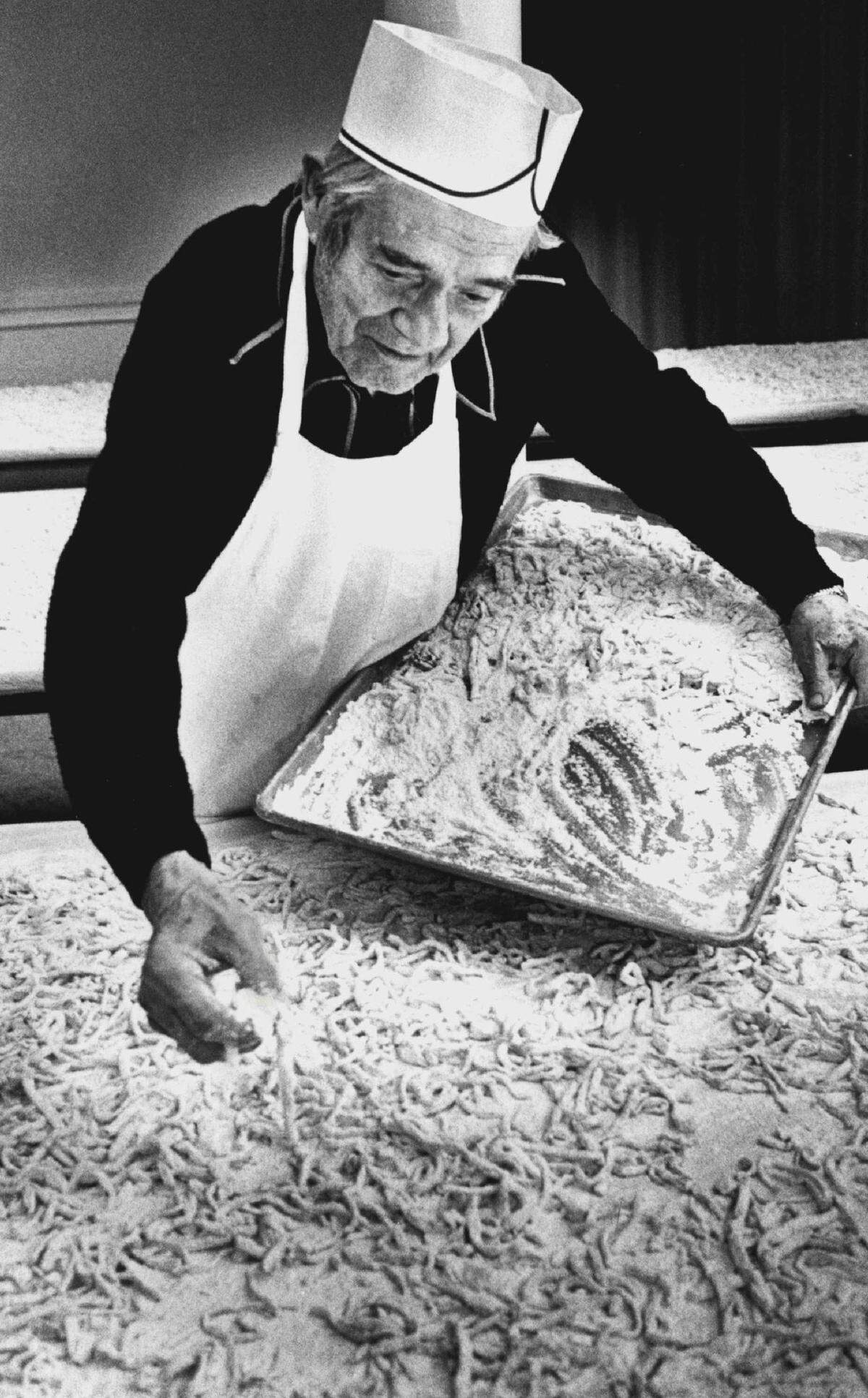 Pictured in 1983: Byron Spray helped prepare noodles for the annual St. Paul United Methodist Chicken Noodle Dinner.