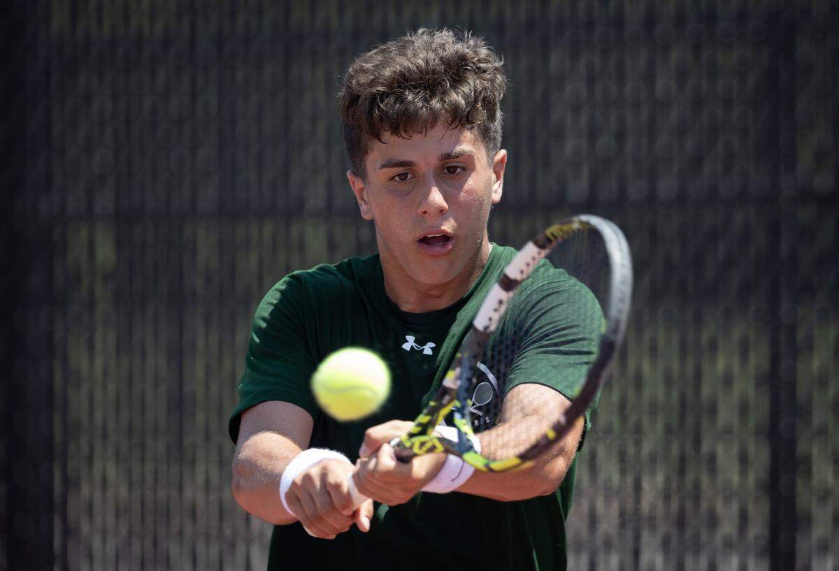 Brandon Steven won the 5A singles tennis title over Maize South’s Evan Goates on Saturday at the Andover tennis complex.