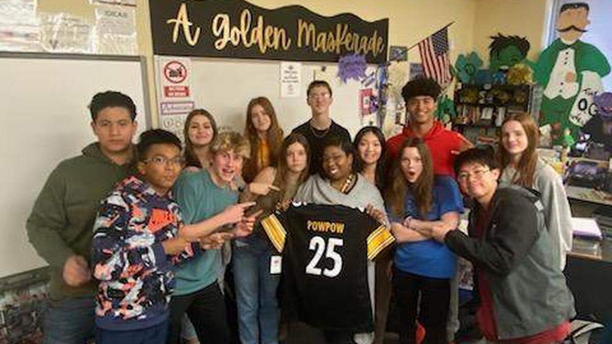 LaShay Powell, center holding jersey, will be featured on the Tuesday-morning episode of the “Today” show.