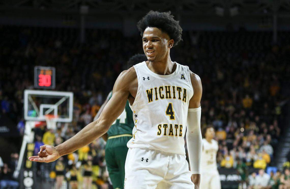 Wichita State’s Ricky Council IV celabrates a three-pointer late in the second half against South Florida to help seal the win for the Shockers on Saturday at Koch Arena.