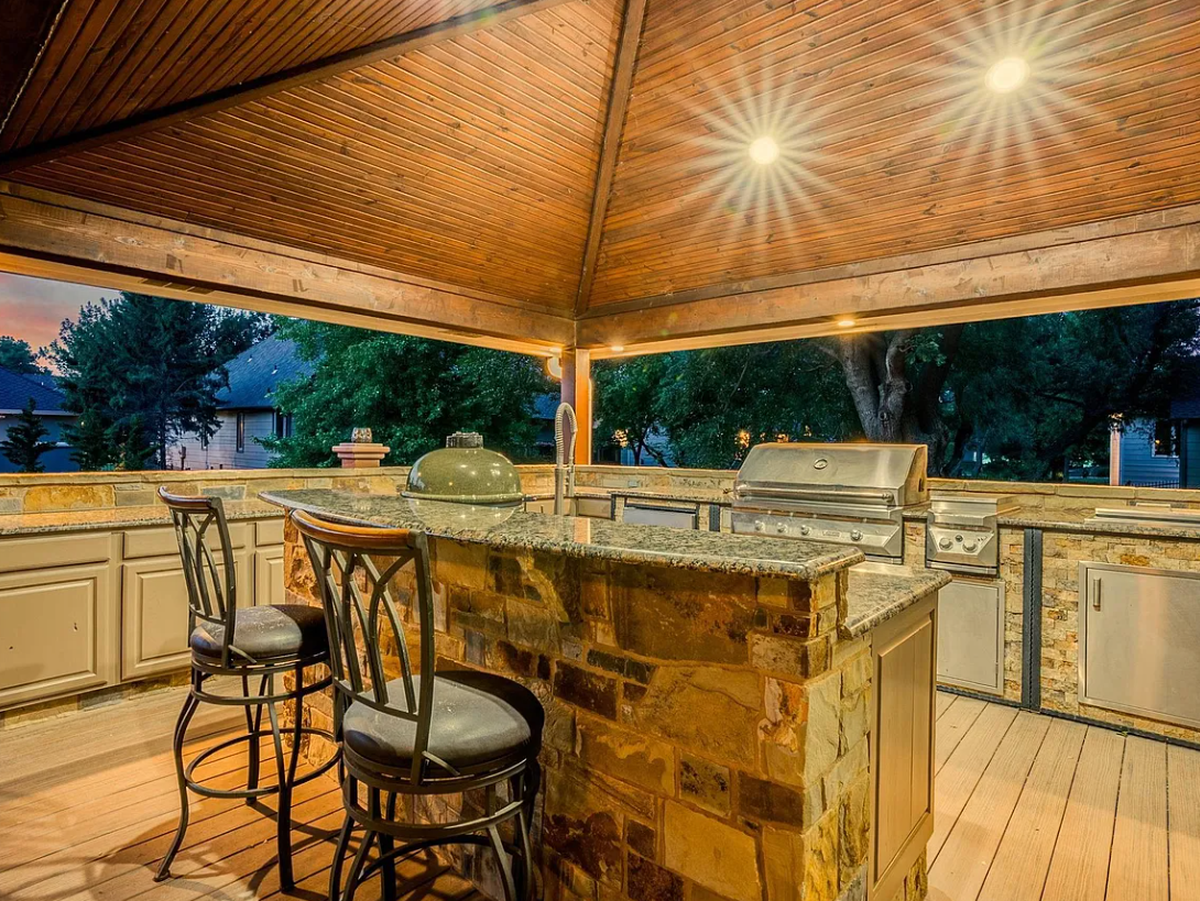 The outdoor kitchen in 2868 N. Wild Rose Court is seen in this listing photo.