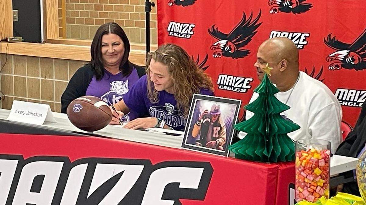 Maize high school quarterback Avery Johnson signed his national letter of intent to play football for Kansas State on Wednesday.