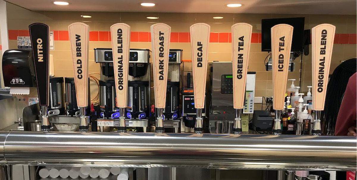 The new Dunkin’ stores, including the one opening in Derby this week, feature a tap system that dispenses cold-brew coffee and iced tea.