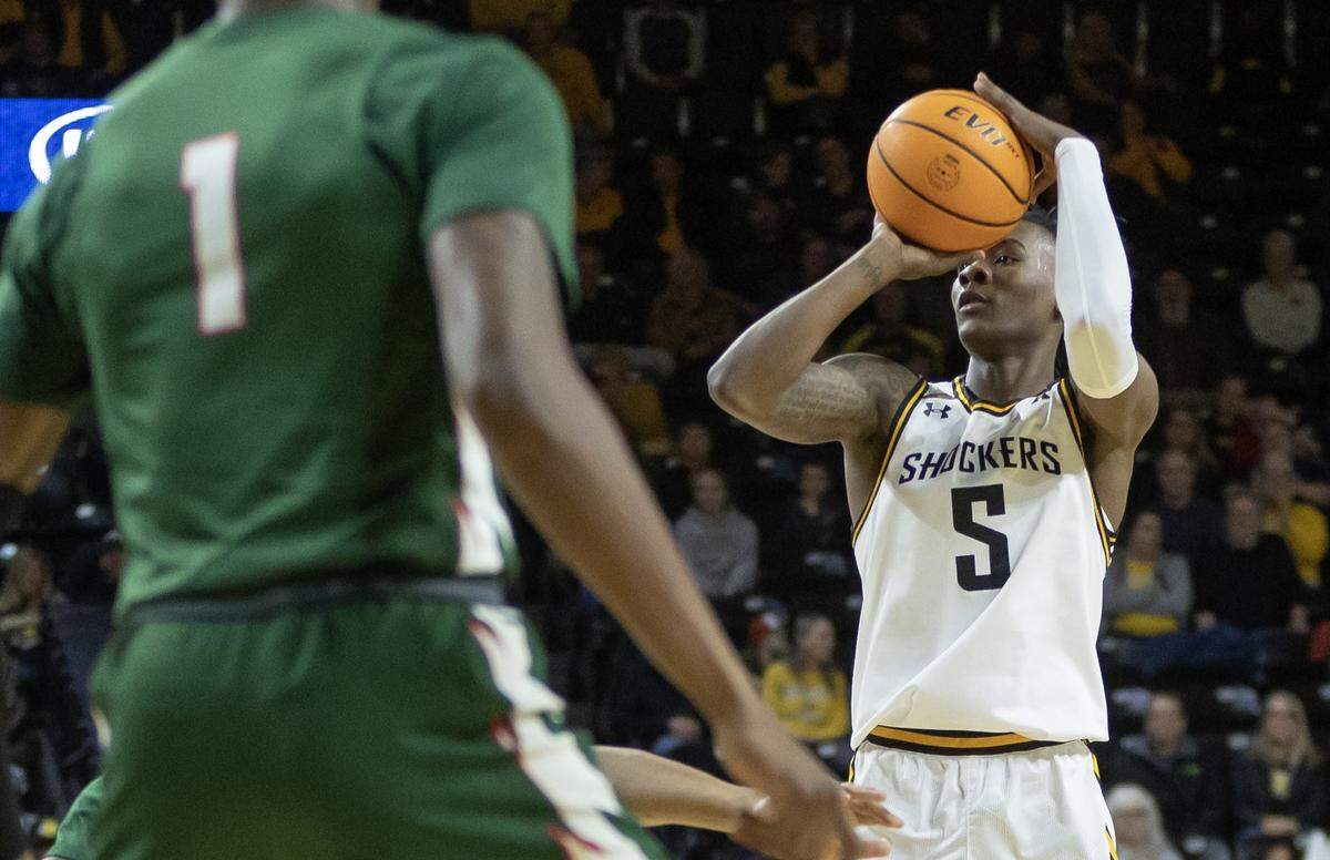 Jaron Pierre Jr., hits one of his five three-pointers during the first half of their game against Mississippi Valley State on Tuesday night at Koch Arena.