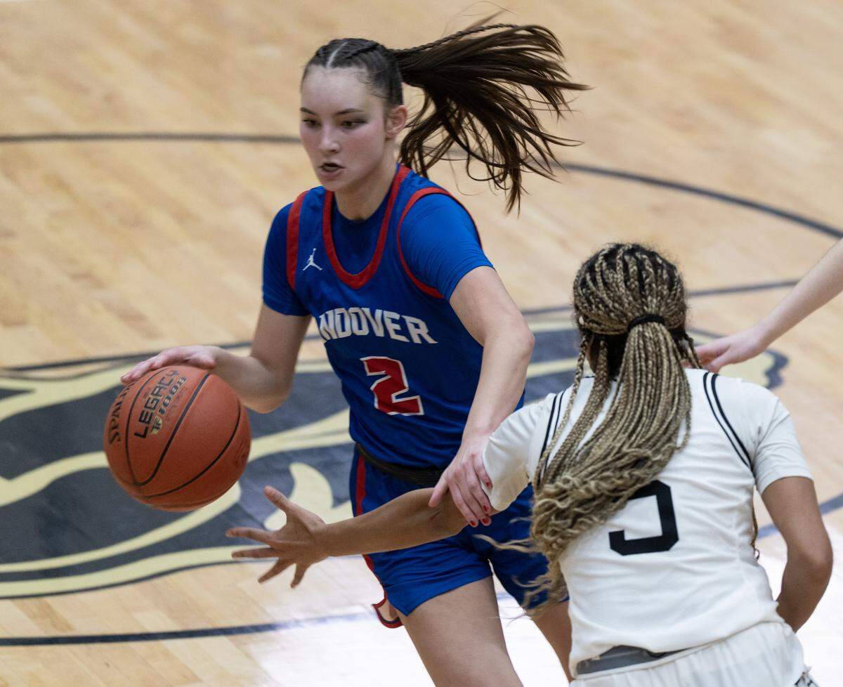 Andover’s Bella Bouddhara drives around Maize South’s Aliyah Singhateh.
