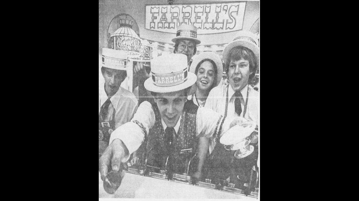 A Wichita Eagle photo from 1975 shows the enthusiastic crew working at Ferrell’s Ice Cream Parlour when it opened as one of the first tenants of Towne East Square.